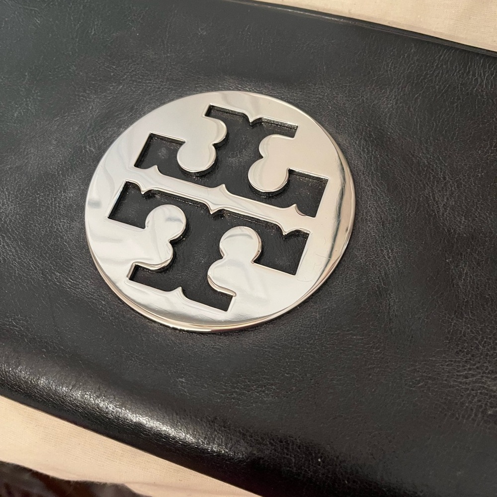 Tory Burch Black Leather Clutch with Silver Emblem like new